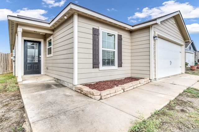 exterior space with a garage