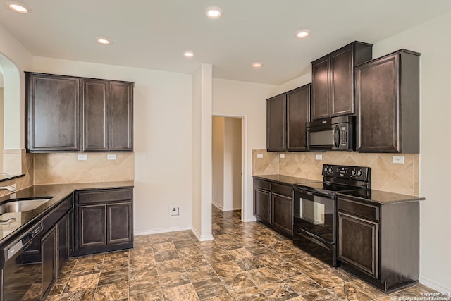 kitchen featuring black appliances, decorative backsplash, dark brown cabinetry, and sink