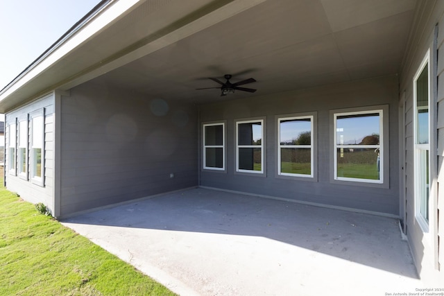 view of patio with ceiling fan