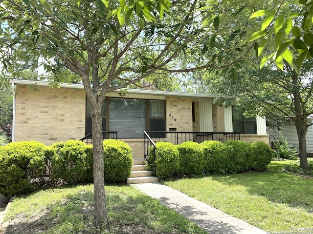 view of front of house with a front yard