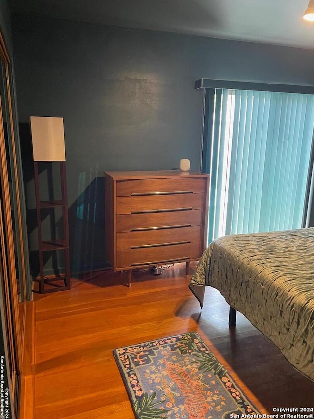 bedroom featuring wood-type flooring