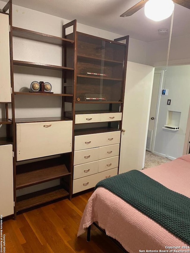 bedroom featuring hardwood / wood-style floors and ceiling fan