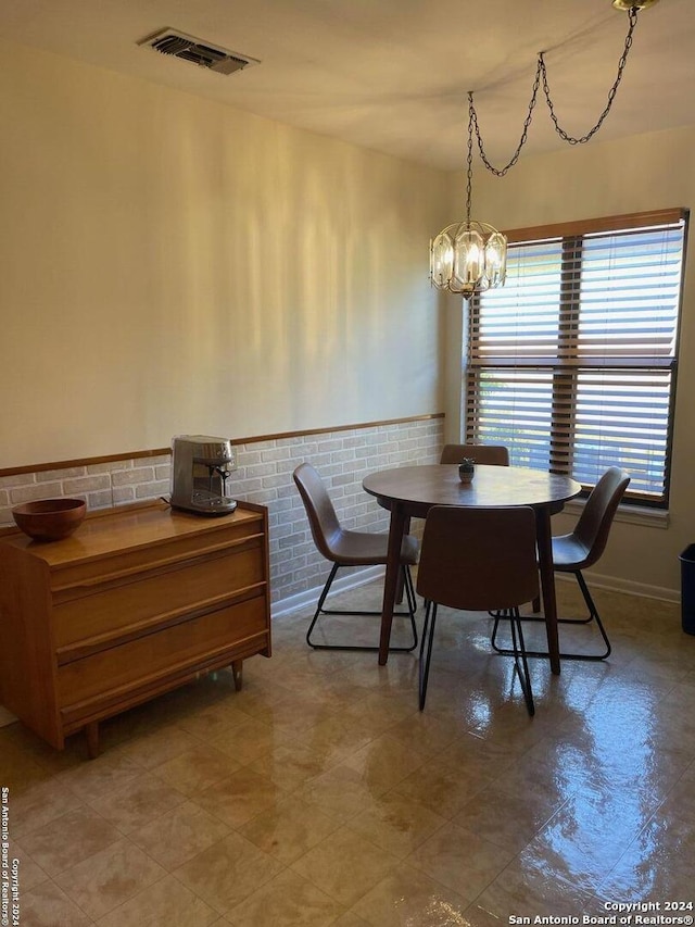 dining room with an inviting chandelier