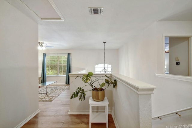 hallway featuring light hardwood / wood-style flooring