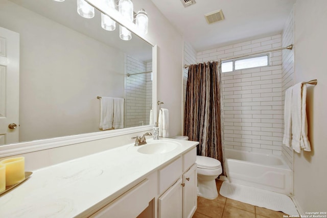 full bathroom featuring tile patterned floors, vanity, toilet, and shower / bathtub combination with curtain