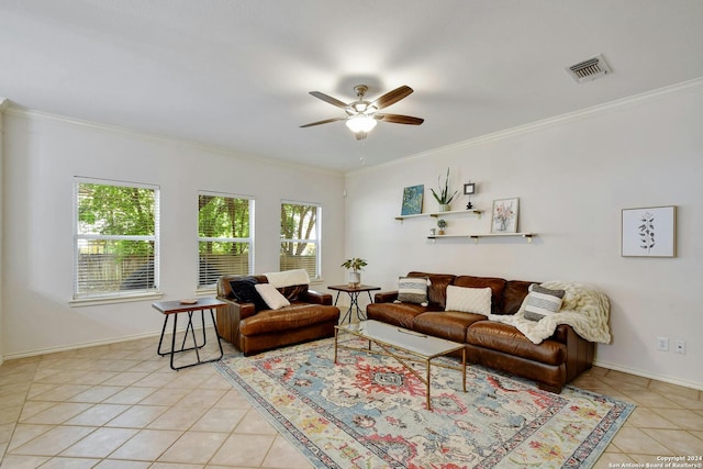 tiled living room featuring ceiling fan and ornamental molding