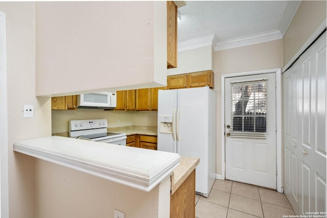 kitchen with light tile patterned flooring, white appliances, crown molding, and kitchen peninsula