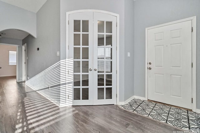 entrance foyer featuring hardwood / wood-style floors and french doors