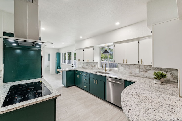 kitchen featuring white cabinets, black electric stovetop, sink, stainless steel dishwasher, and decorative backsplash