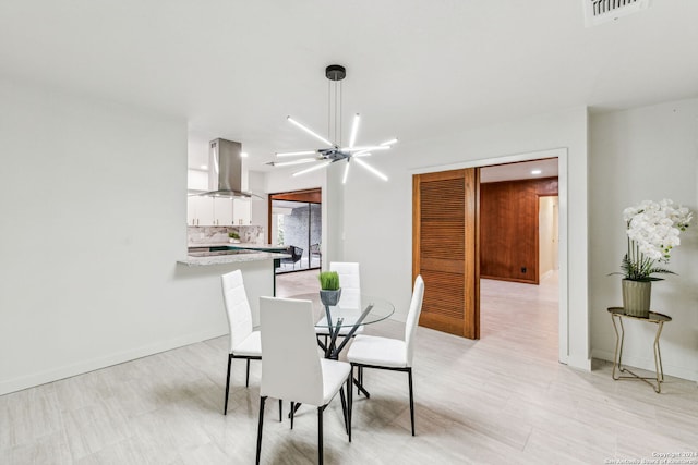 dining room featuring a chandelier