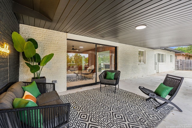 view of patio with ceiling fan and an outdoor hangout area