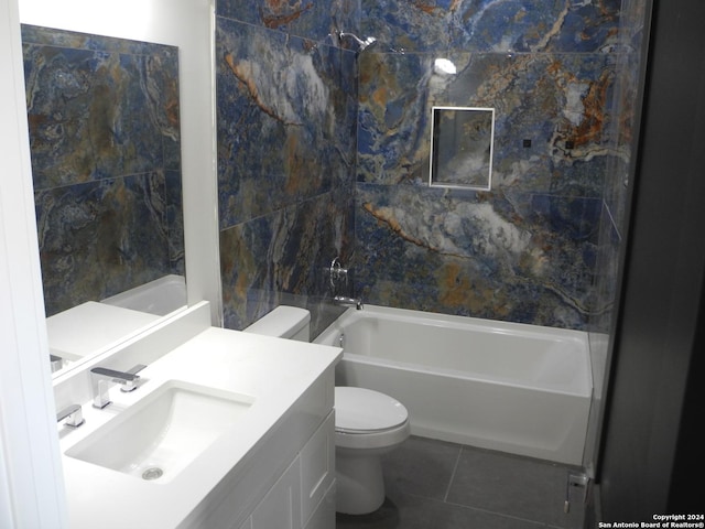 full bathroom with tile patterned floors, shower / bathtub combination, vanity, tile walls, and toilet