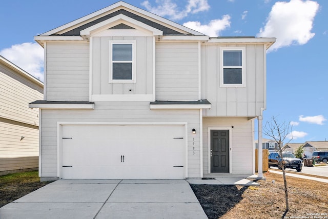 view of front of property featuring a garage