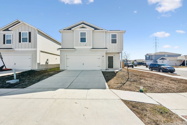 view of front of property with a garage