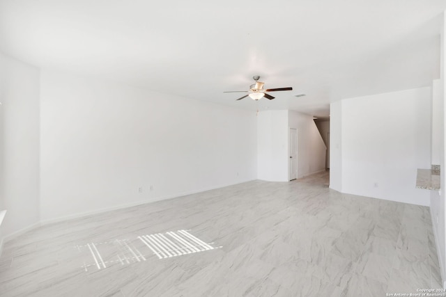 empty room featuring ceiling fan