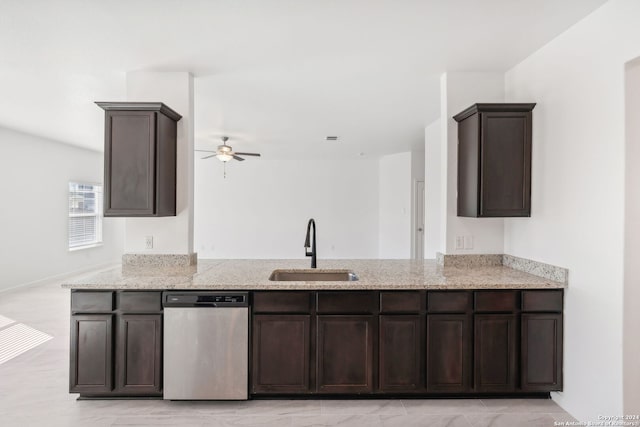 kitchen with dishwasher, dark brown cabinets, and sink