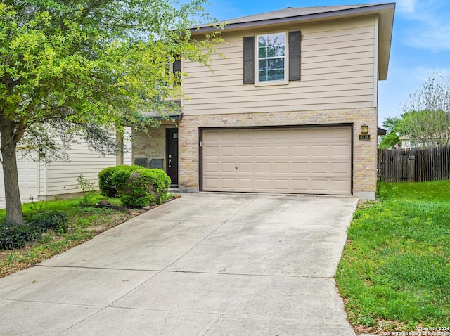 front of property with a garage