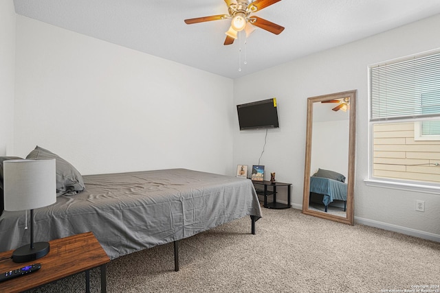 bedroom featuring carpet flooring and ceiling fan