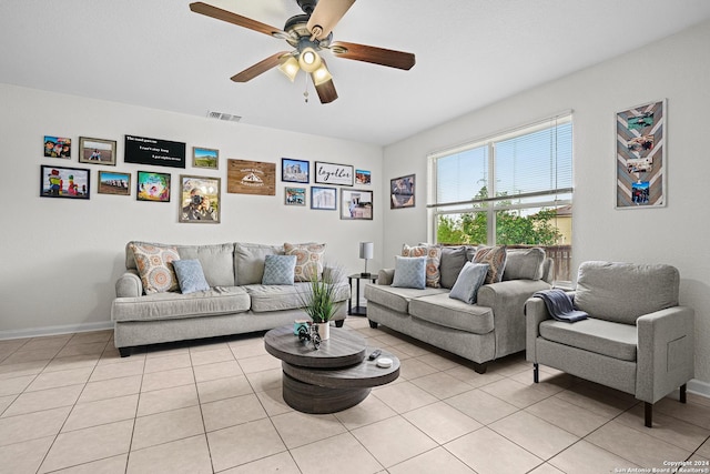 tiled living room featuring ceiling fan