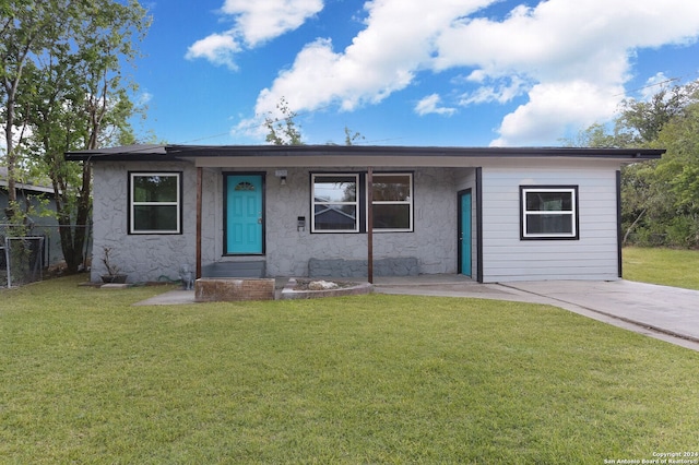 ranch-style home with a front yard