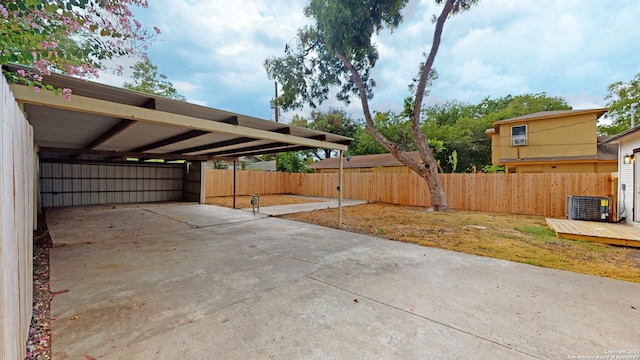 view of patio featuring a carport