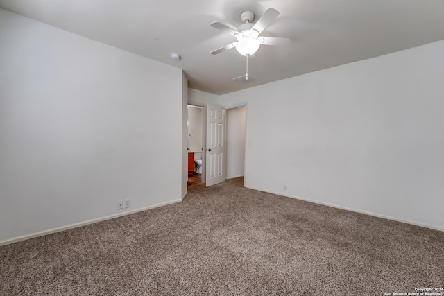 unfurnished bedroom featuring ceiling fan and carpet floors