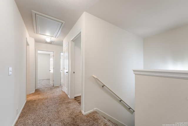 hallway with light carpet