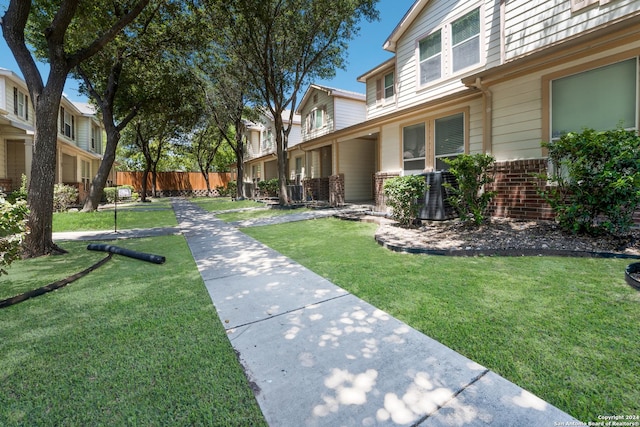 surrounding community featuring a lawn