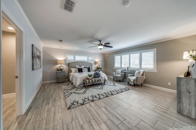 bedroom with ceiling fan and ornamental molding