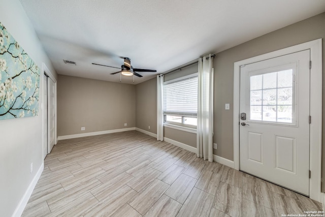 entryway with ceiling fan