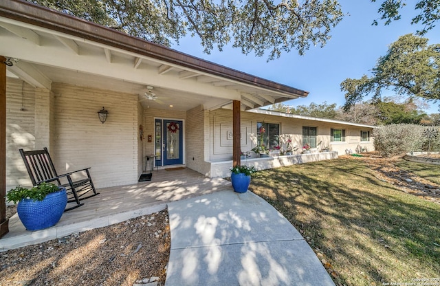 exterior space with a porch and a yard