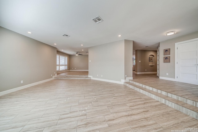 empty room featuring ceiling fan