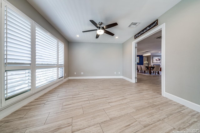 spare room featuring ceiling fan