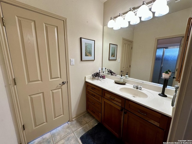 bathroom featuring tile patterned floors and vanity