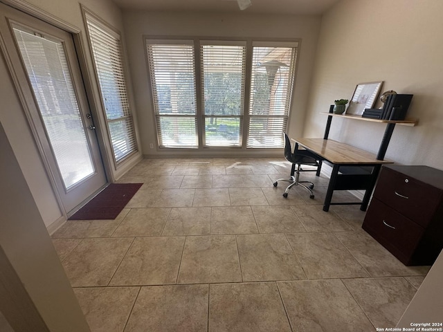 office area with light tile patterned floors