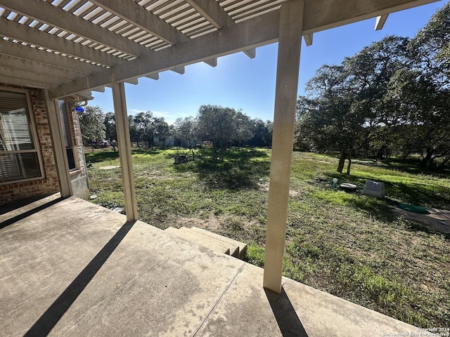 view of patio featuring a pergola