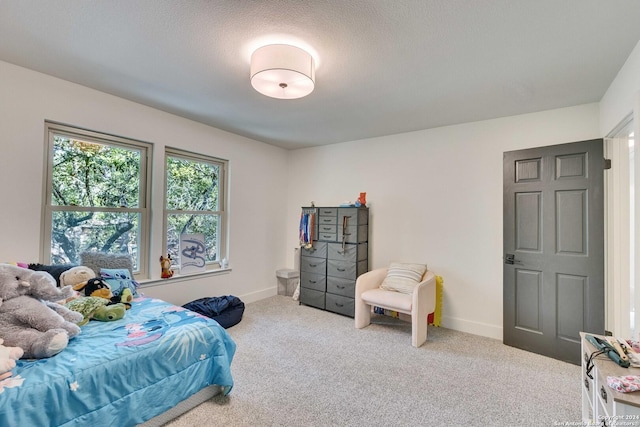 bedroom with light carpet