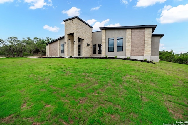 modern home with a front yard