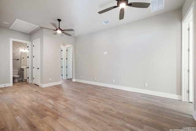 spare room featuring ceiling fan and light hardwood / wood-style floors