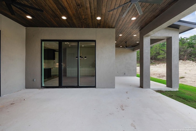 view of patio featuring ceiling fan