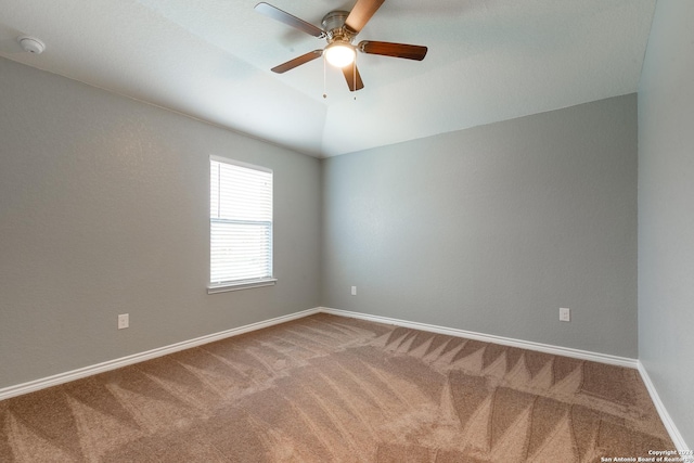 spare room with carpet flooring and ceiling fan