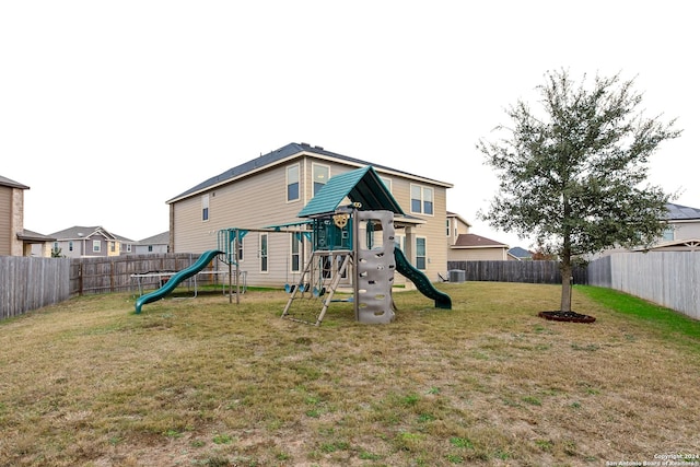 view of playground featuring a yard and cooling unit