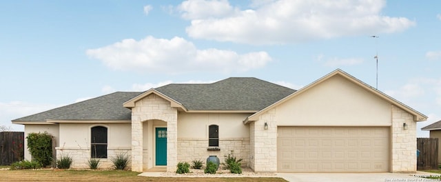 view of front of home with a garage