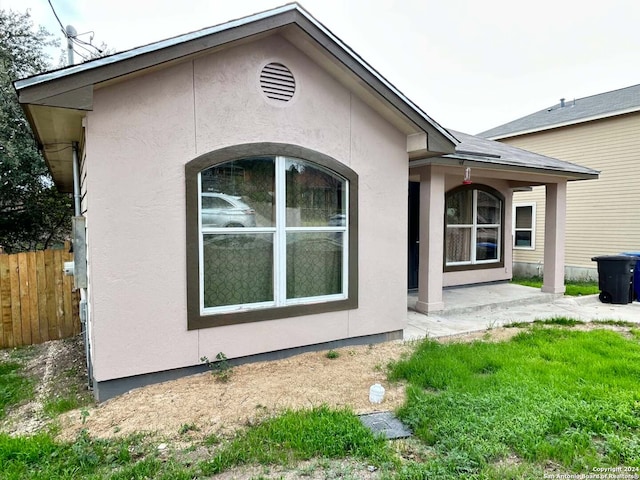 back of house with a patio area