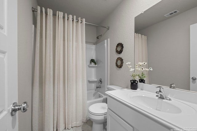 full bathroom featuring vanity, shower / bath combo, and toilet