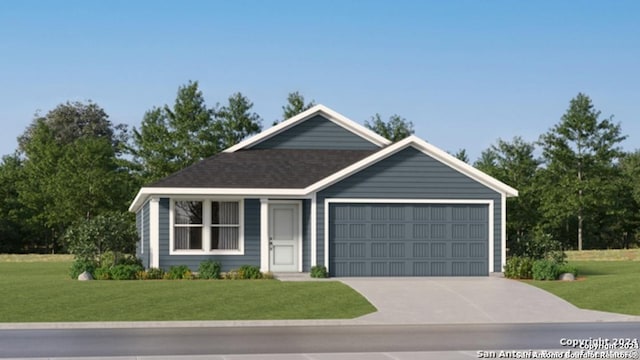 view of front of home with a garage and a front yard