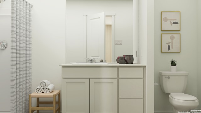 bathroom with vanity and toilet