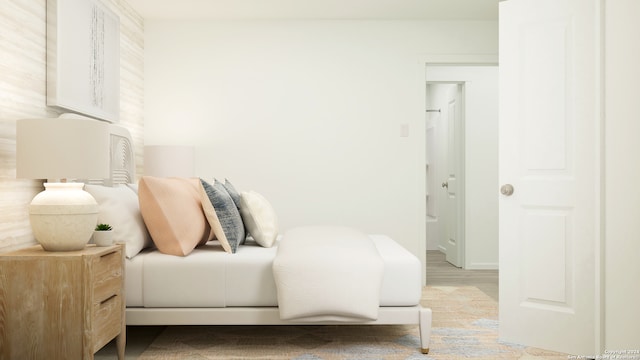 bedroom with light wood-type flooring