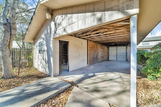 exterior space with a carport