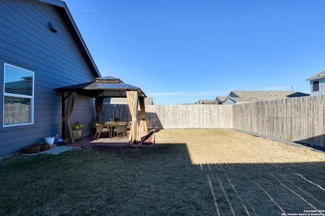 view of yard featuring a gazebo and a patio